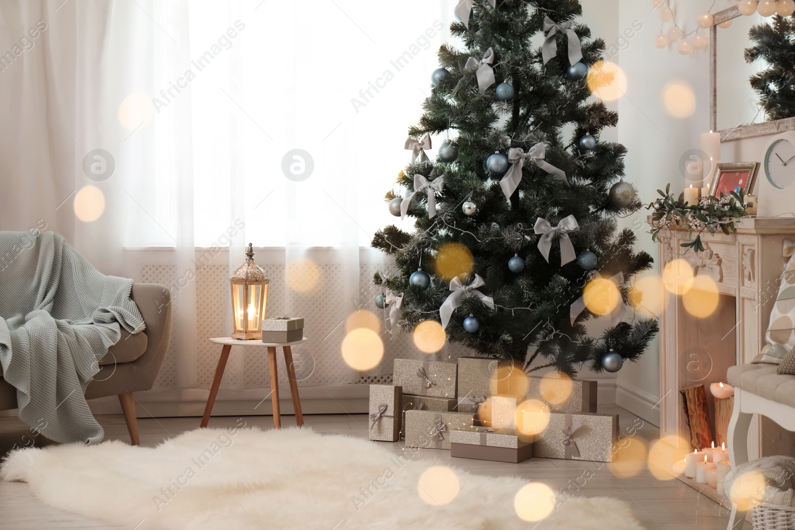 Photo of Stylish living room interior with decorated Christmas tree and blurred lights in foreground