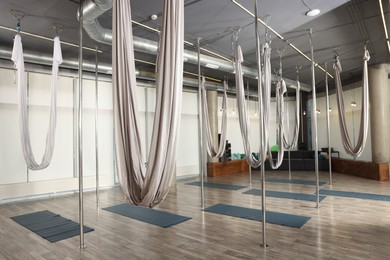 Many hammocks for fly yoga in studio