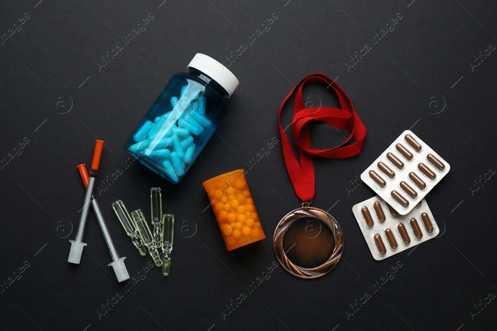 Photo of Flat lay composition with drugs on black background. Doping control