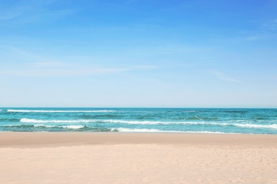 Photo of Picturesque view of beautiful sea and sandy beach on sunny day