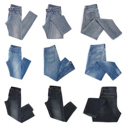 Set with different jeans on white background, top view