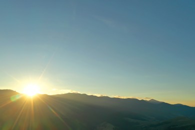 Aerial view of beautiful mountain landscape at sunrise