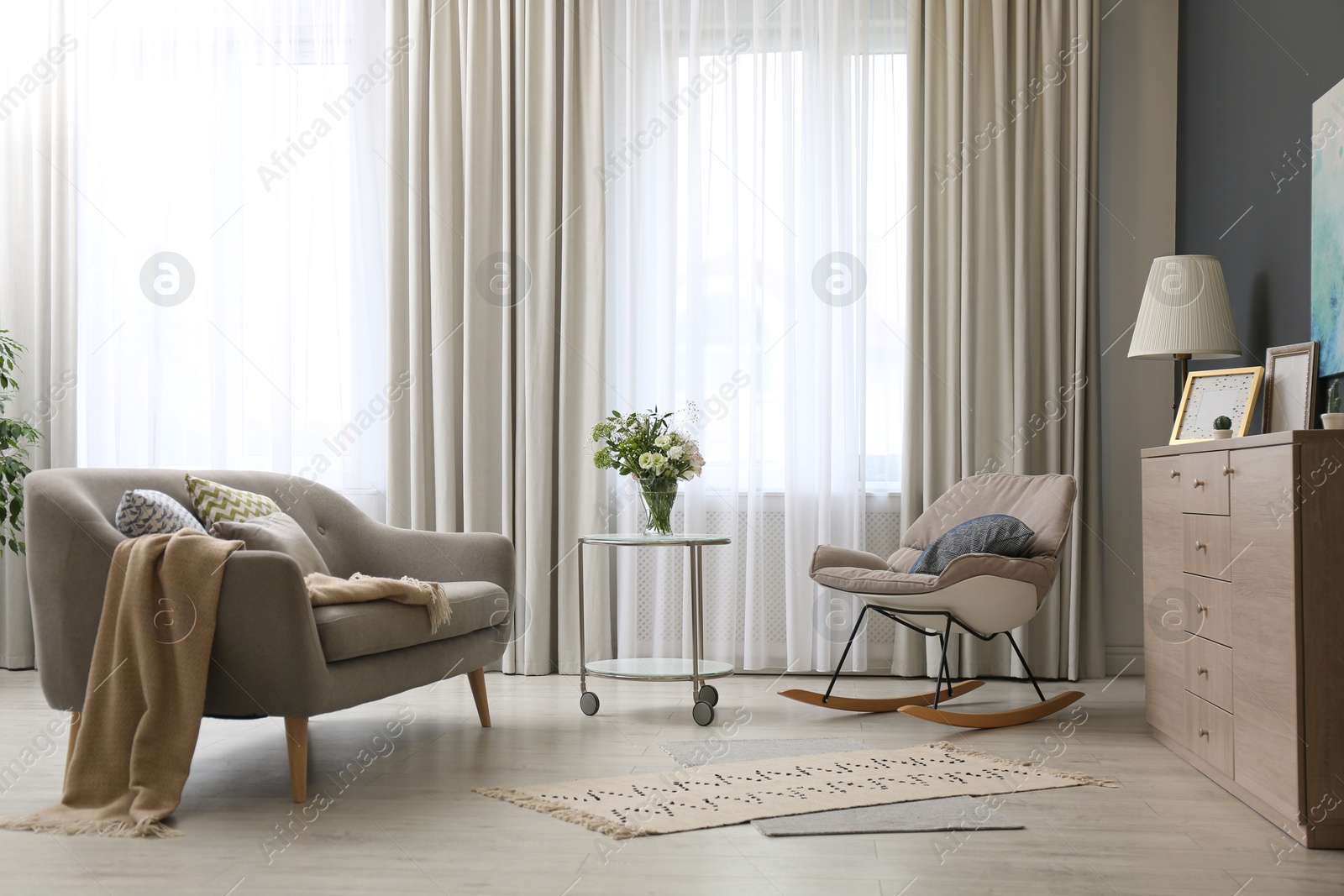 Photo of Modern living room interior with beautiful curtains on window