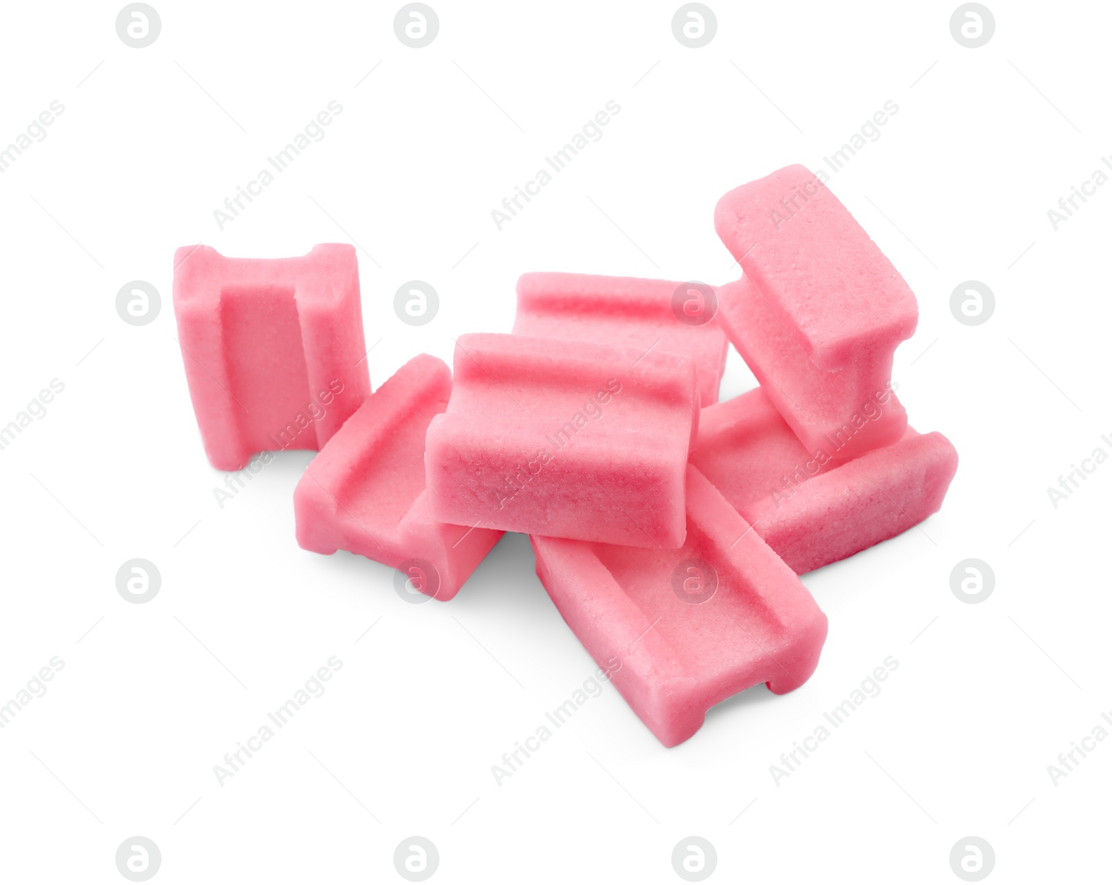 Photo of Many tasty pink chewing gums on white background