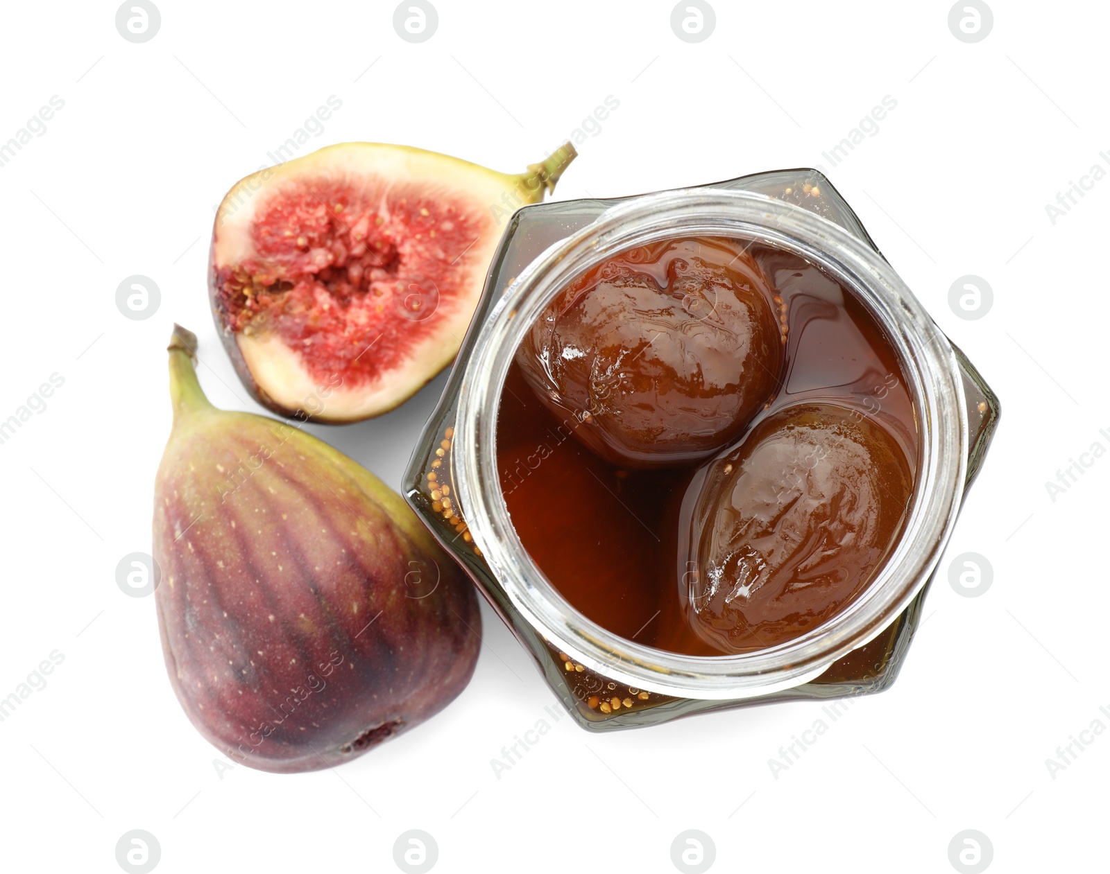 Photo of Jar of tasty sweet jam and fresh figs isolated on white, top view