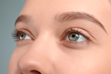 Young woman with beautiful natural eyelashes, closeup