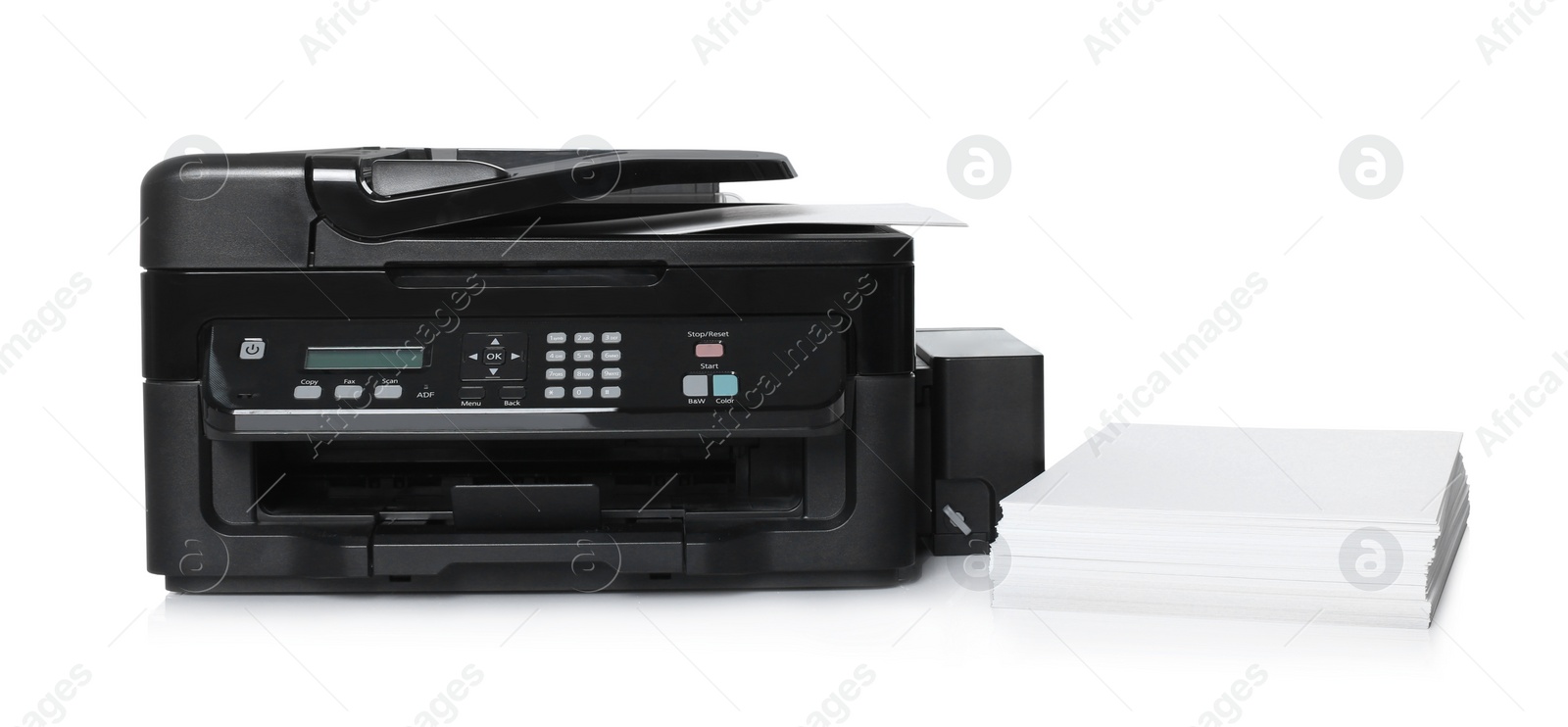 Photo of Modern printer and stack of paper on white background