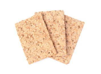 Photo of Fresh crunchy crispbreads on white background, top view