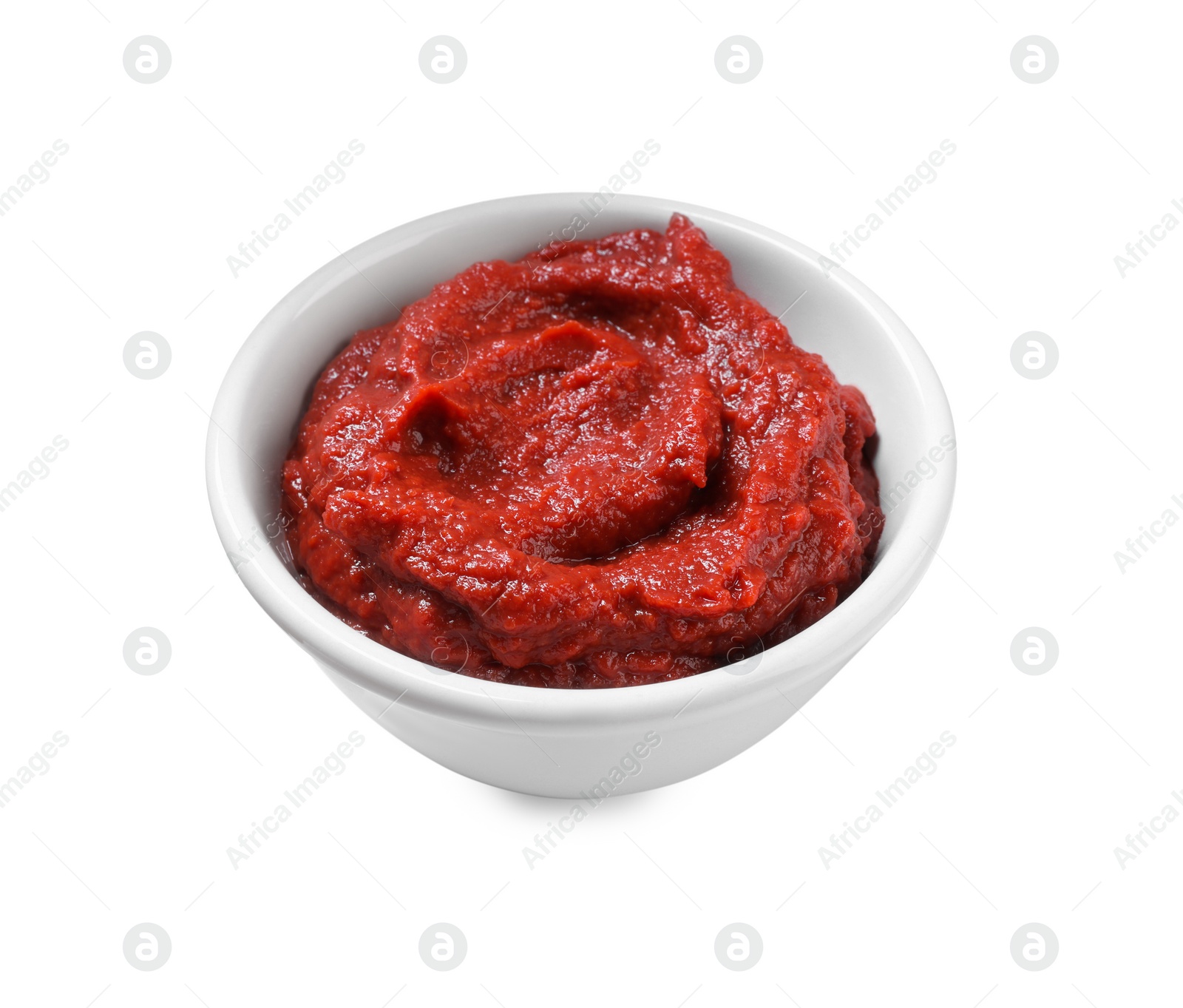 Photo of Bowl of tasty tomato paste isolated on white