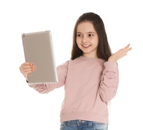 Little girl using video chat on tablet against white background