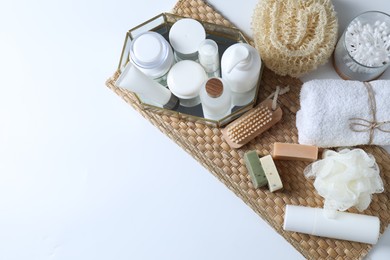 Bath accessories. Flat lay composition with personal care products on white background, space for text