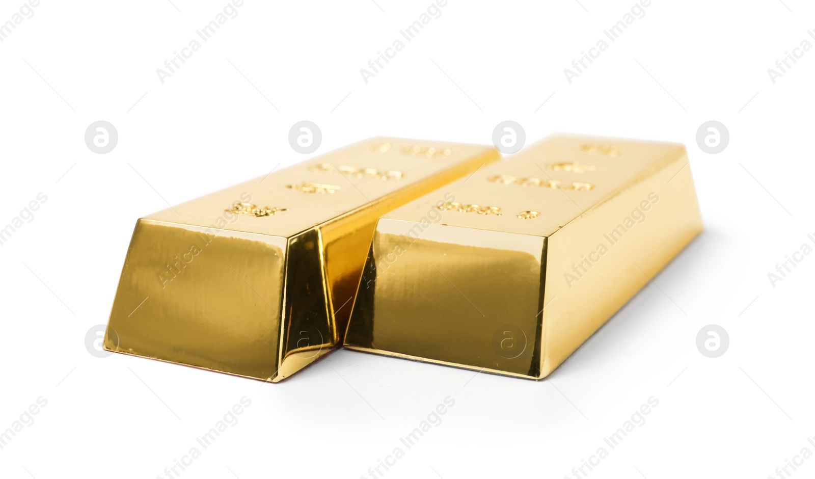 Photo of Two shining gold bars isolated on white