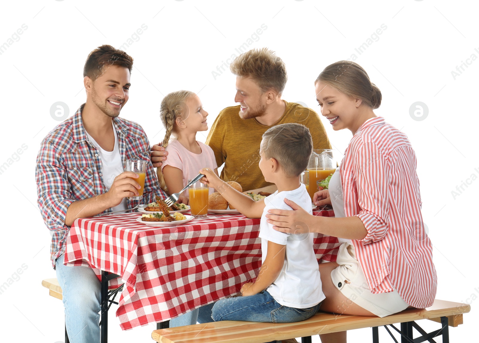 Photo of Happy family having picnic at table on white background