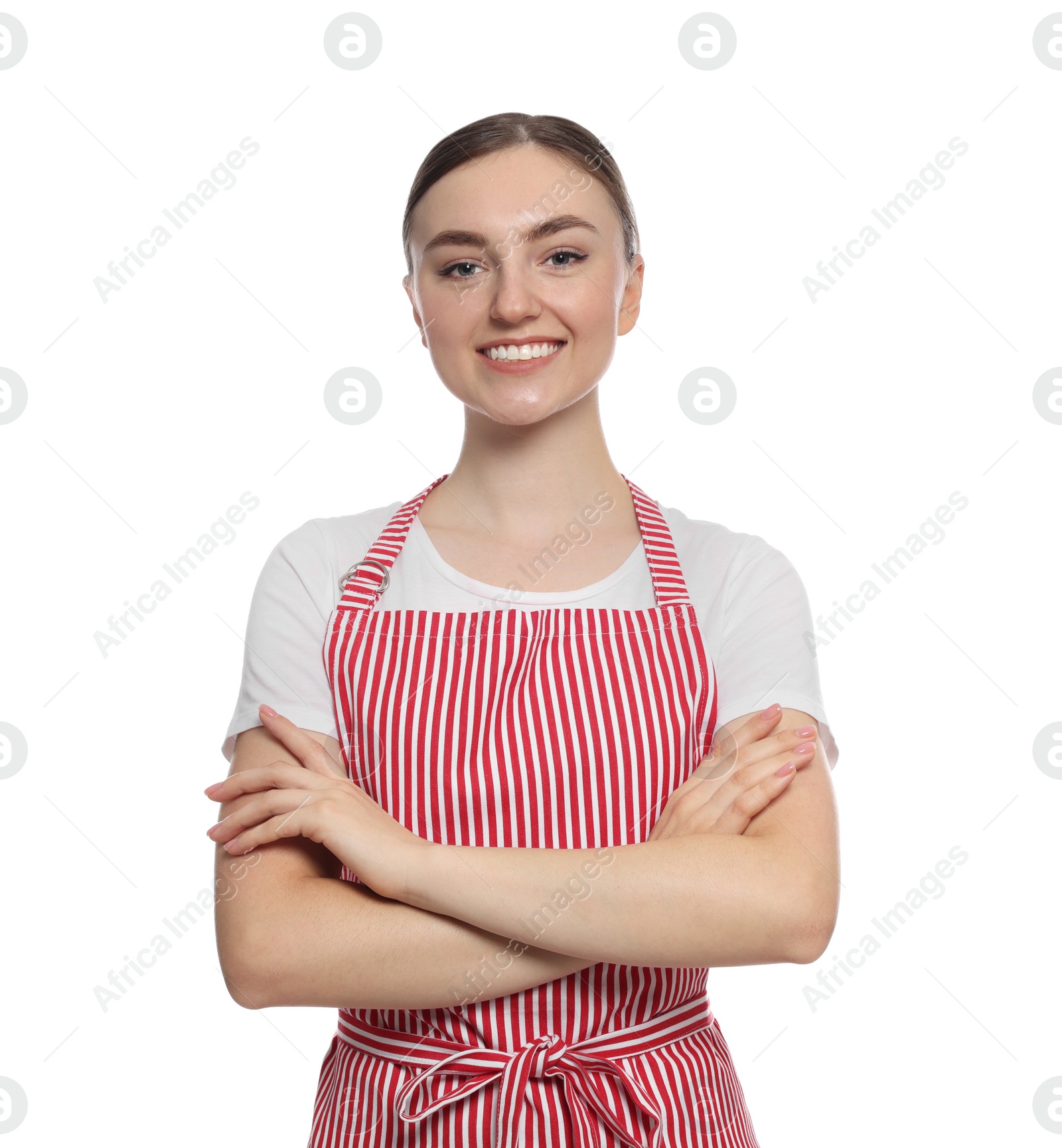 Photo of Beautiful young woman in clean striped apron on white background