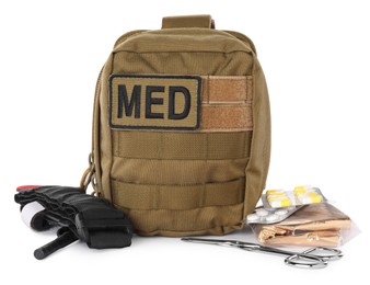 Photo of Military first aid kit with items isolated on white