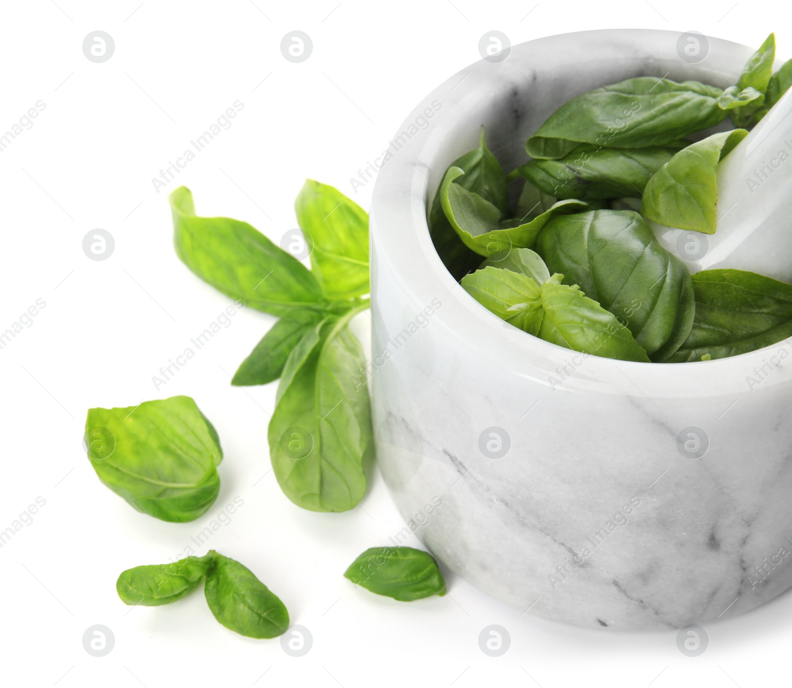 Photo of Mortar with fresh green basil leaves on white background