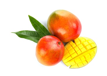 Delicious ripe mangoes on white background, top view