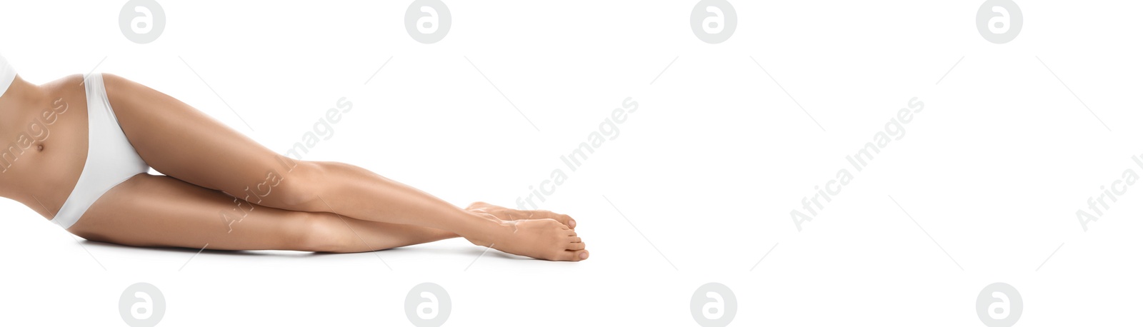 Image of Young woman with beautiful legs after epilation on white background, closeup. Banner design