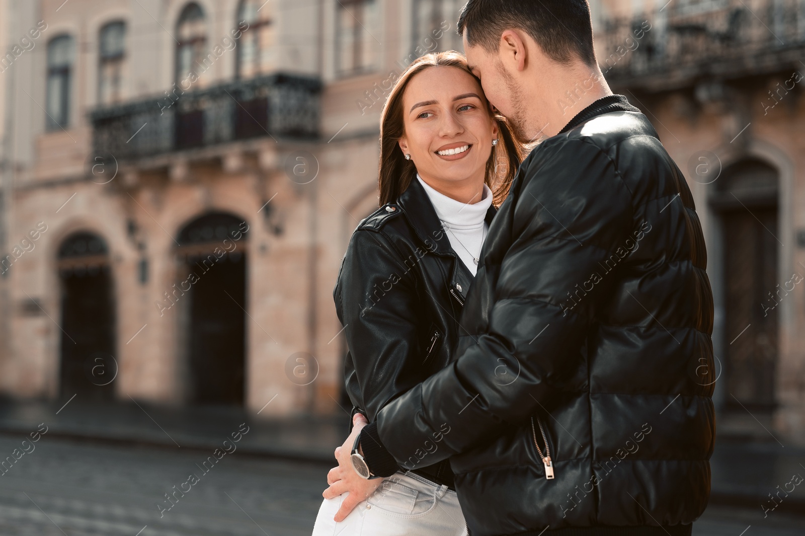 Photo of Lovely young couple enjoying time together outdoors. Romantic date