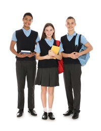 Photo of Full length portrait of teenagers in school uniform on white background