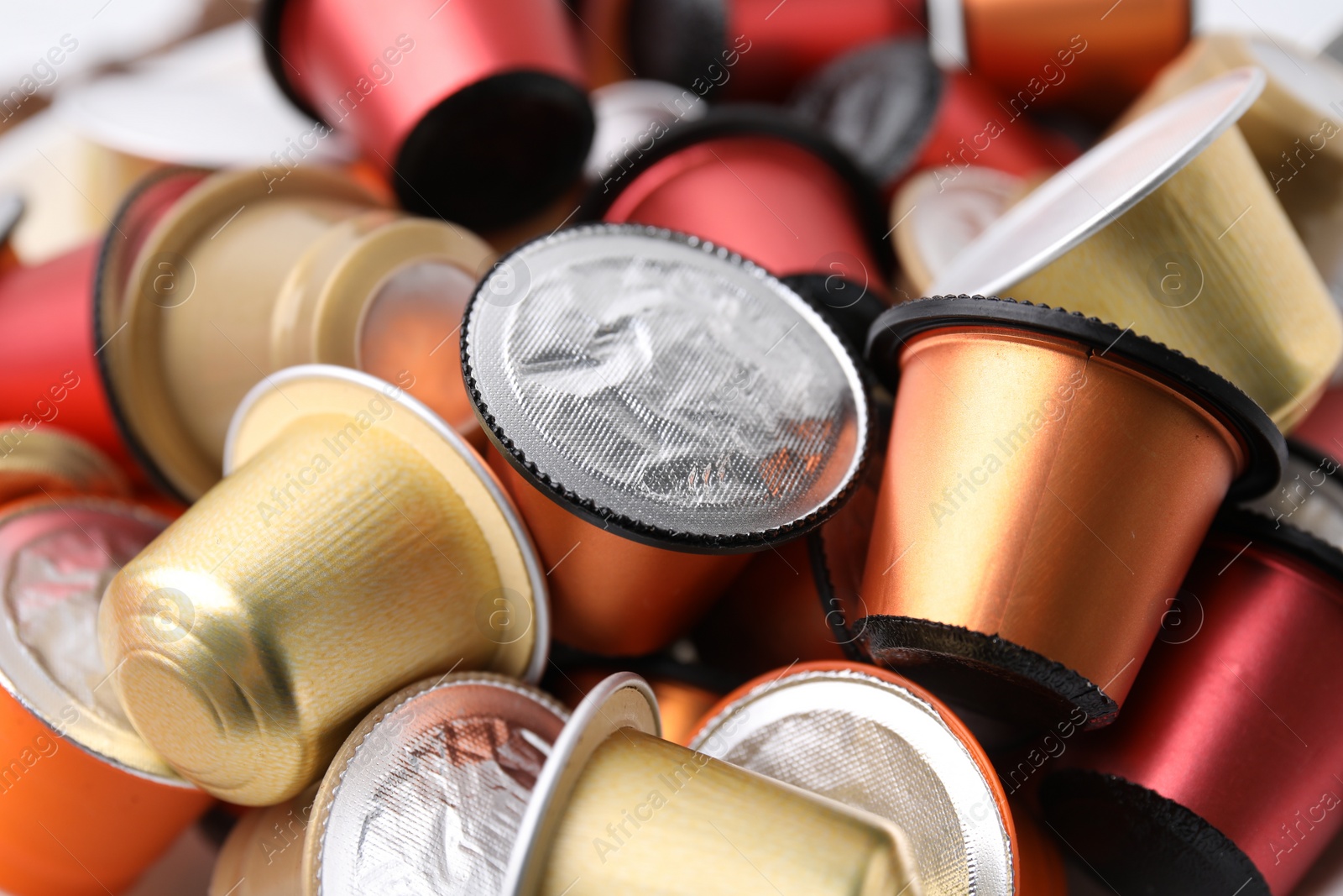 Photo of Many coffee capsules as background, closeup view