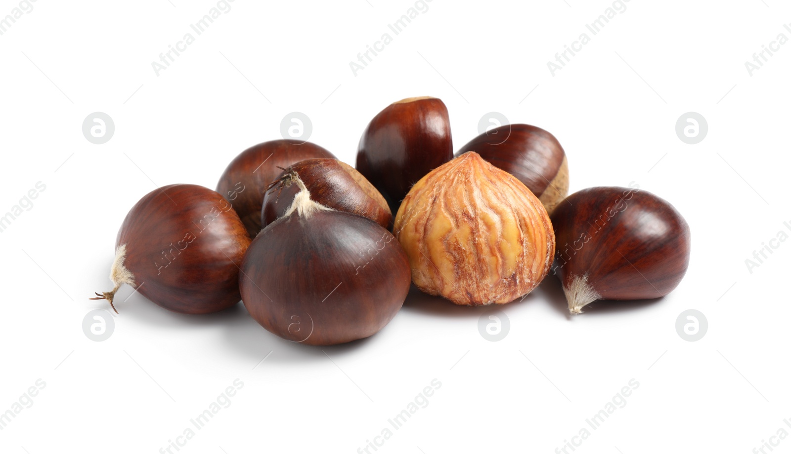 Photo of Fresh sweet edible chestnuts on white background