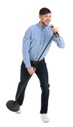 Photo of Handsome man singing in microphone on white background