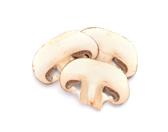 Photo of Slices of fresh champignon mushrooms on white background, top view