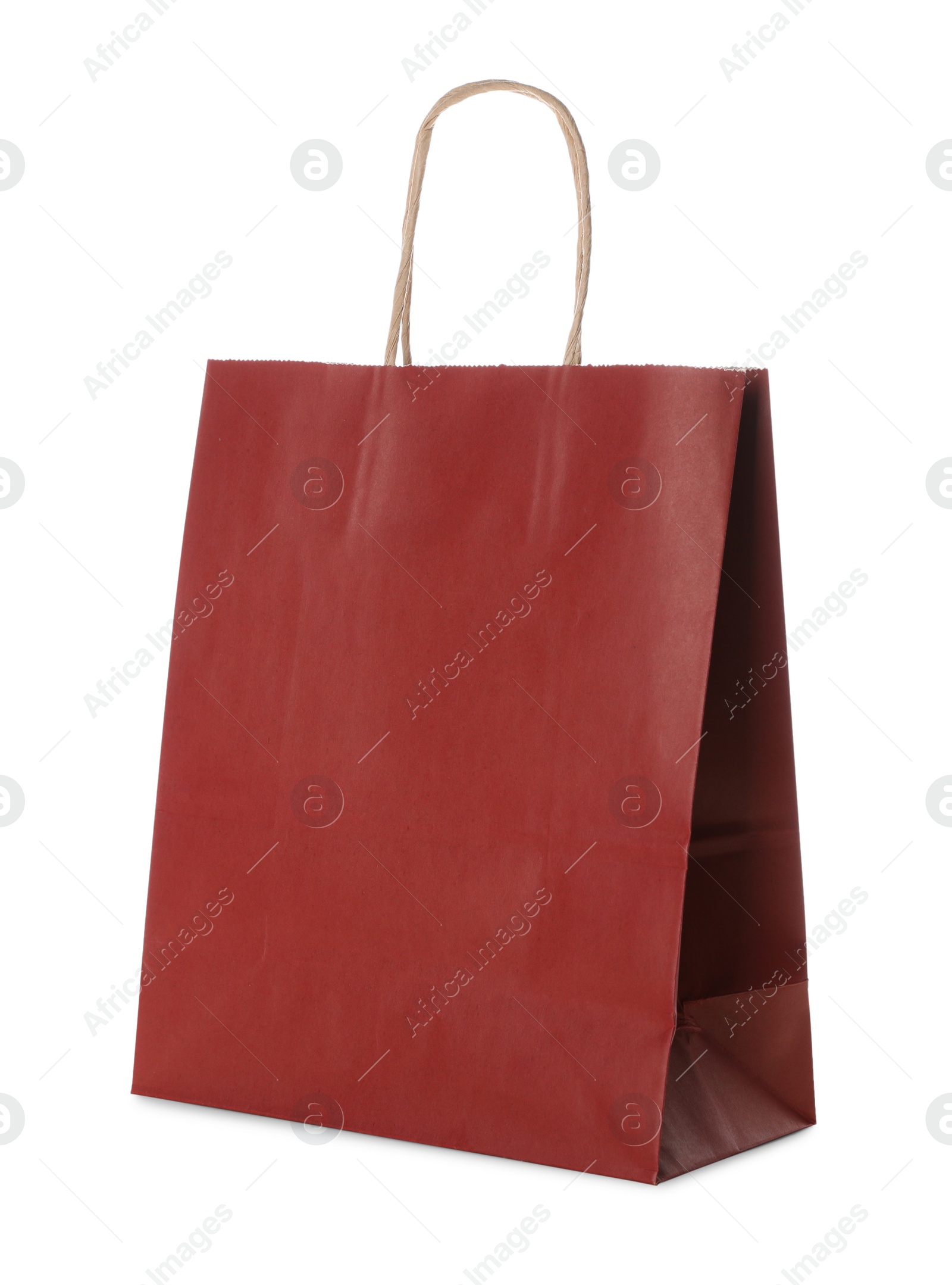 Photo of Blank red paper bag on white background. Space for design