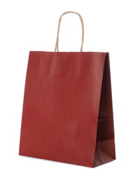 Photo of Blank red paper bag on white background. Space for design