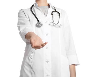Photo of Female doctor giving helping hand on white background