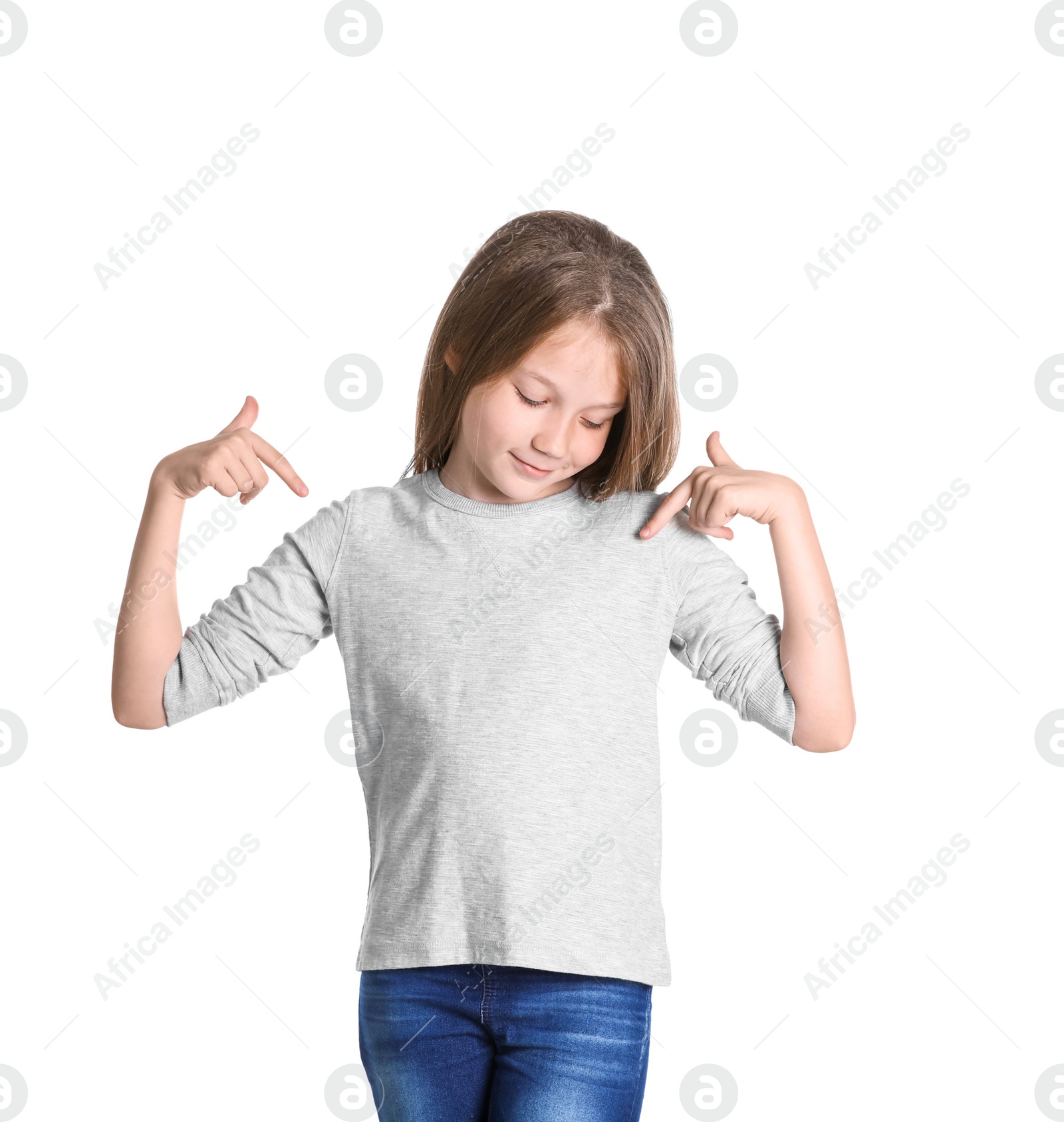 Photo of Little girl in long sleeve t-shirt on white background. Mockup for design