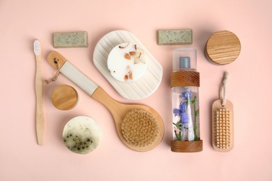 Photo of Eco friendly personal care products on pink background, flat lay
