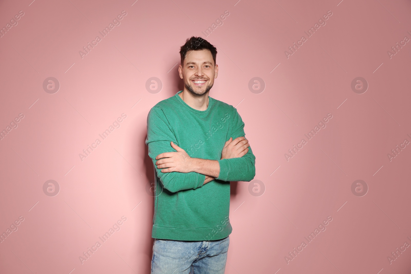 Photo of Portrait of handsome man in stylish clothes on color background