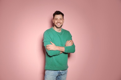 Photo of Portrait of handsome man in stylish clothes on color background