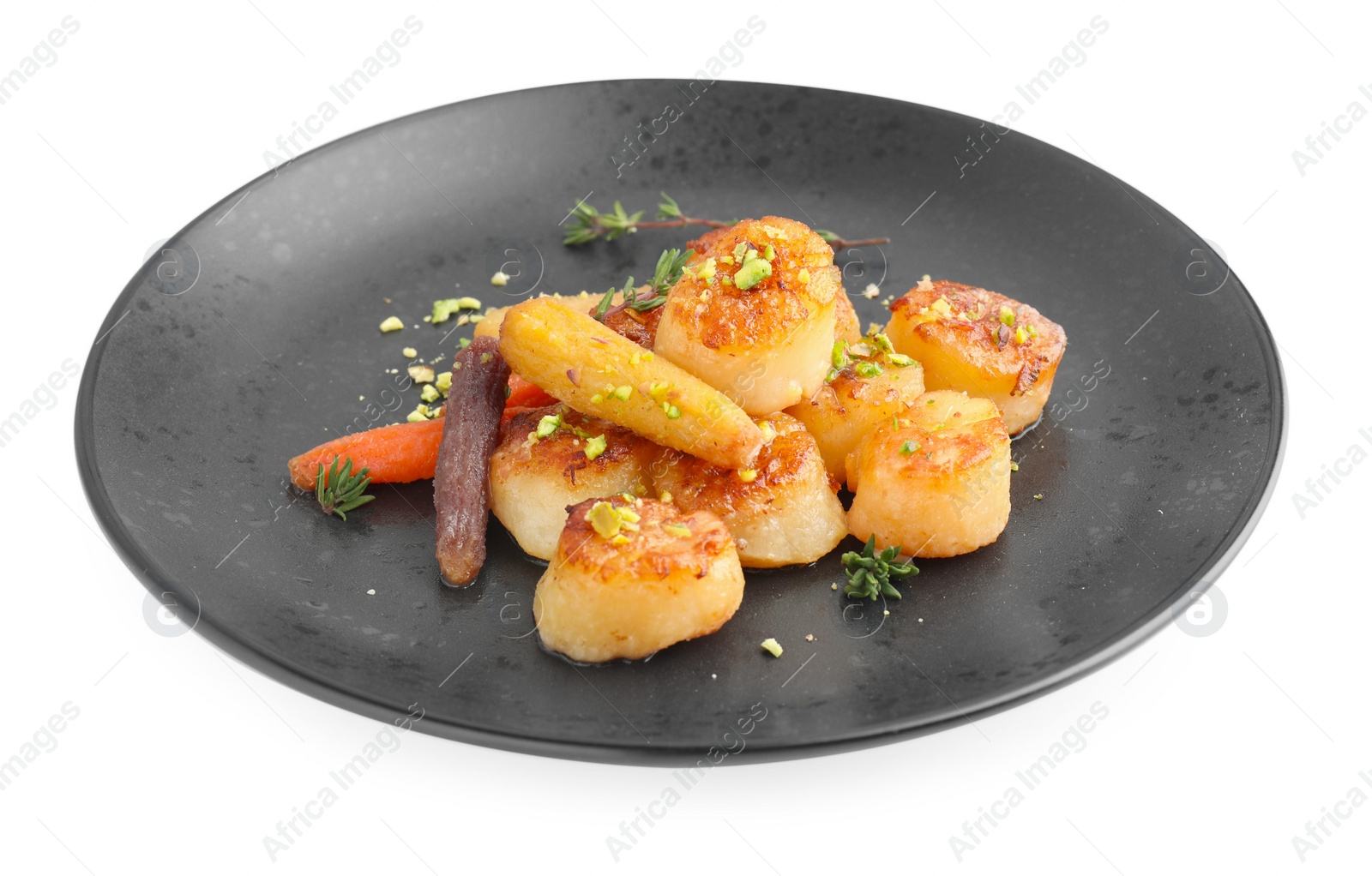 Photo of Delicious fried scallops with carrot and spices isolated on white