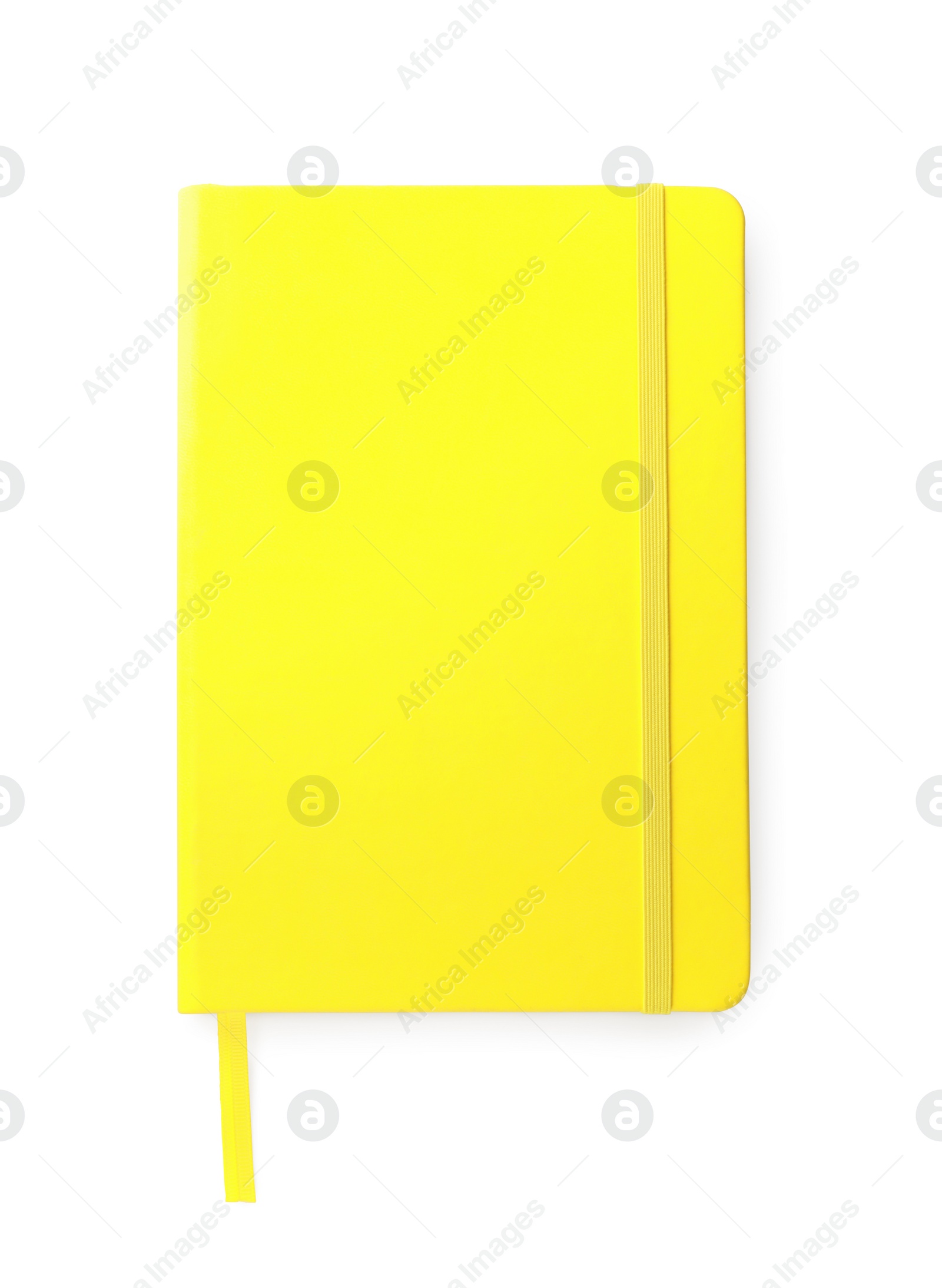 Photo of Closed yellow office notebook isolated on white, top view