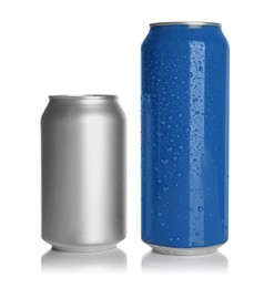 Aluminum cans with drinks on white background