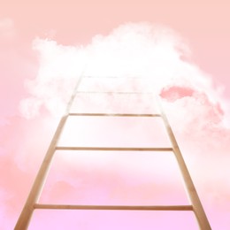 Wooden ladder leading to clouds. Concept of growth and development