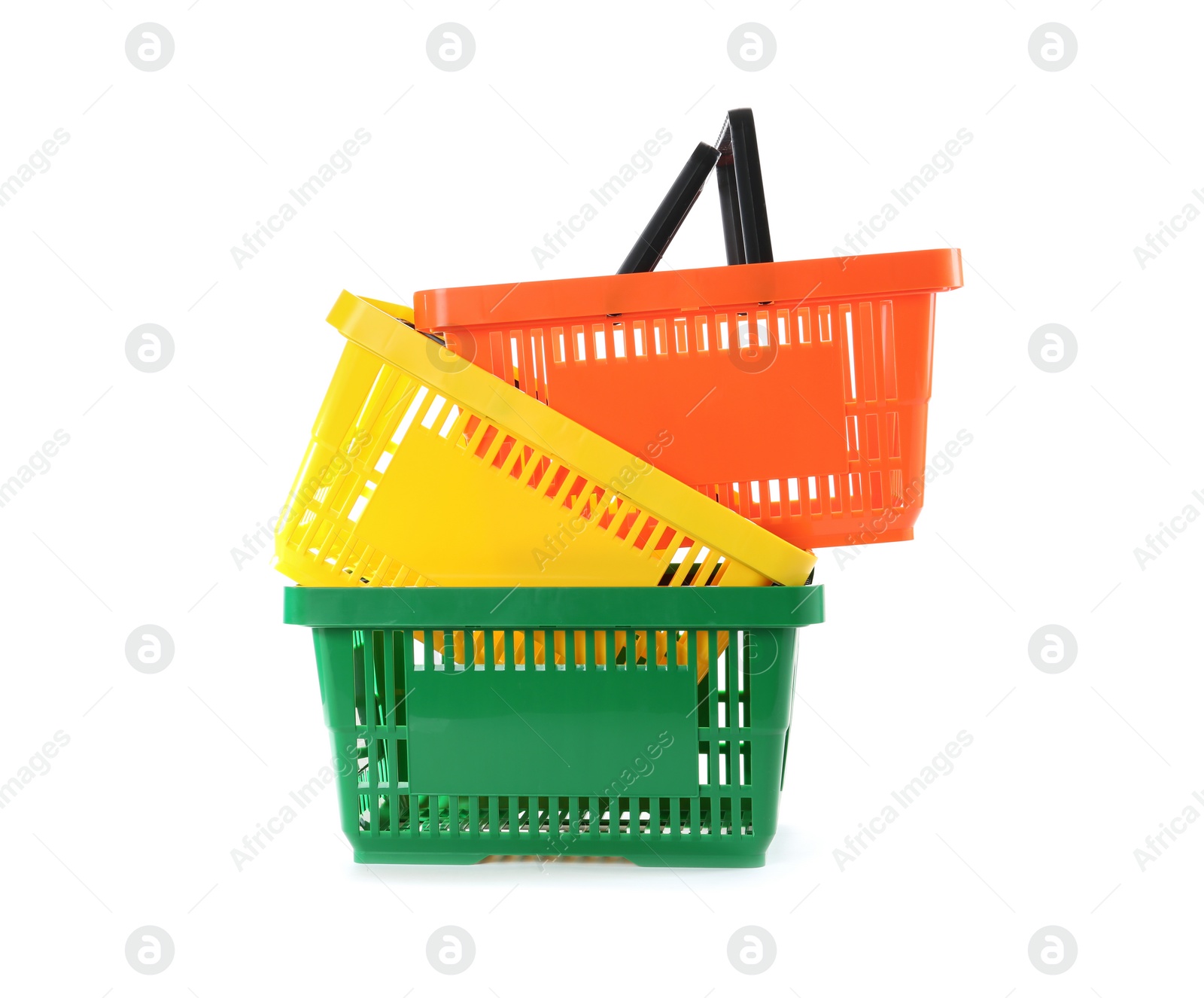 Photo of Colorful plastic shopping baskets on white background