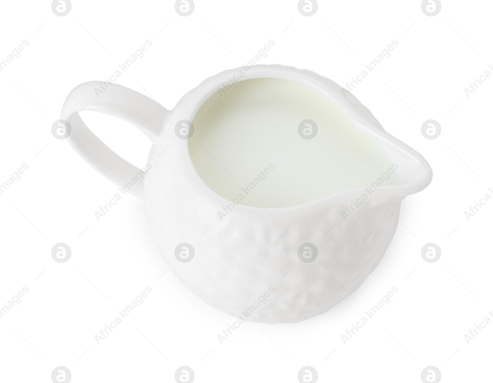 Photo of One jug full of fresh milk isolated on white, above view