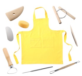 Image of Set of pottery tools and yellow apron on white background