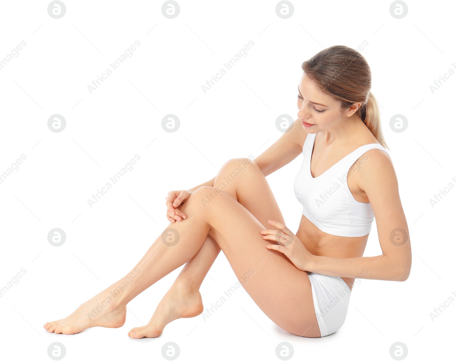 Photo of Portrait of young woman with perfect smooth skin on white background. Beauty and body care