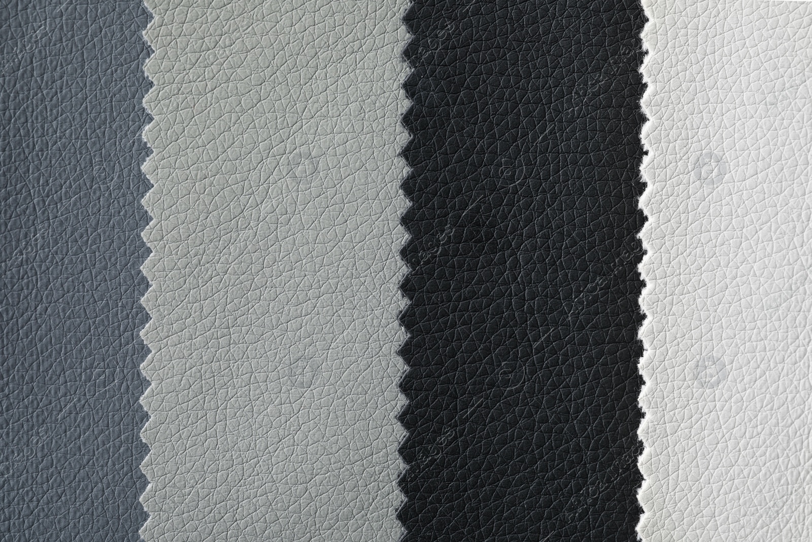 Photo of Leather samples of different colors for design as background, closeup