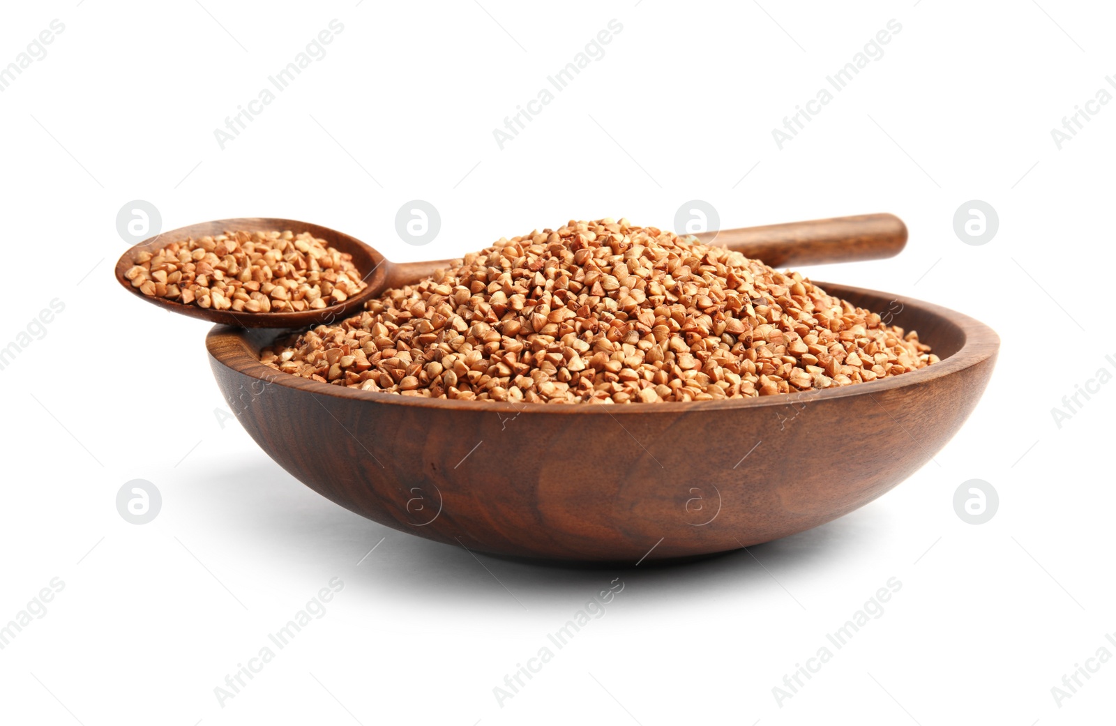 Photo of Bowl and spoon with uncooked buckwheat on white background