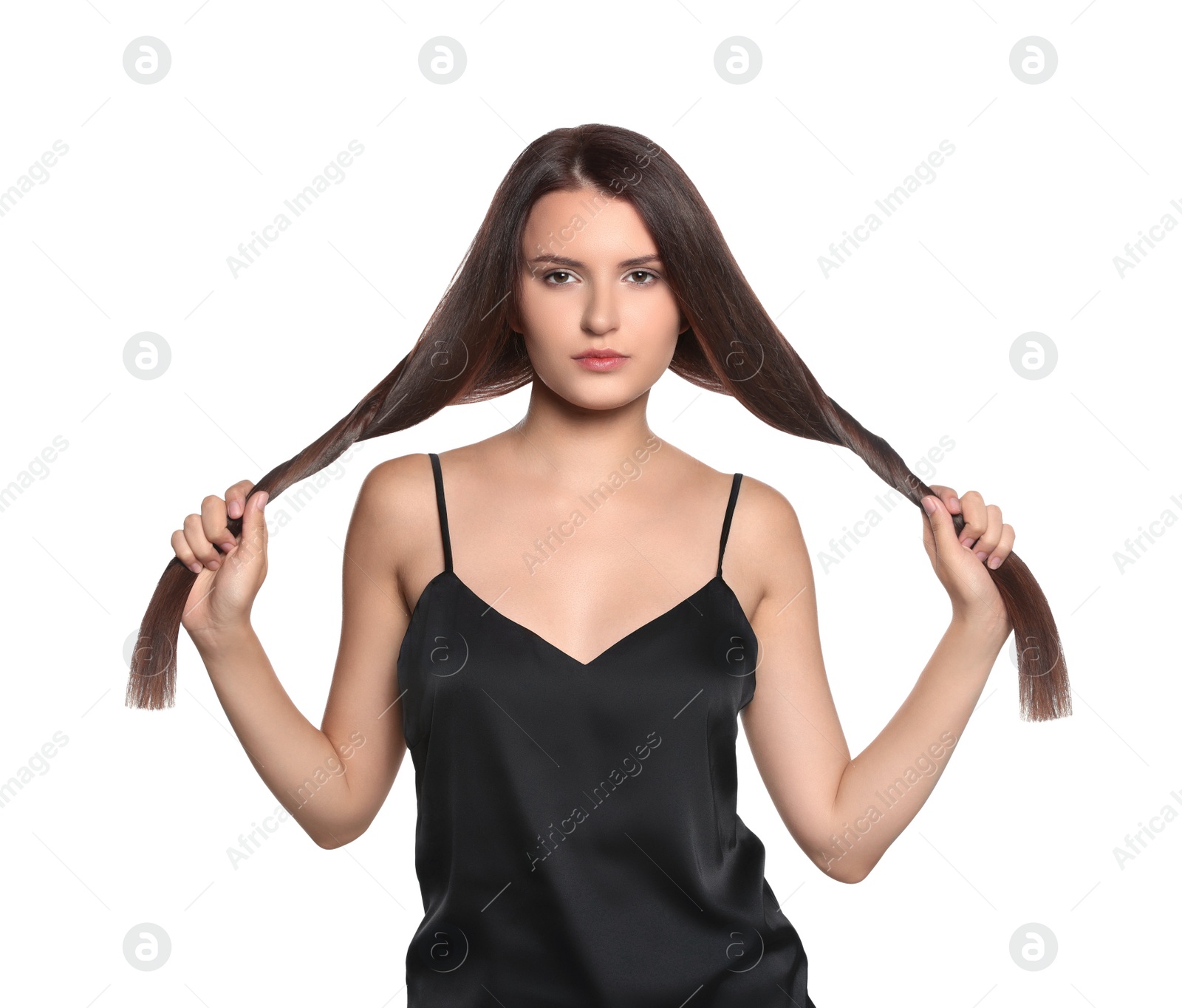 Photo of Portrait of beautiful young woman with healthy strong hair on white background