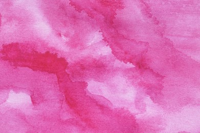 Abstract pink watercolor painting as background, top view