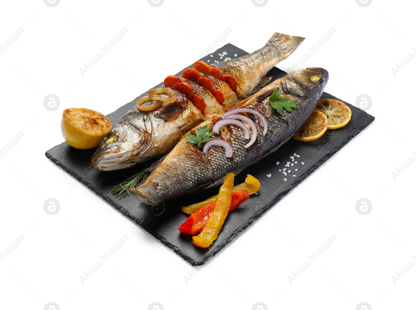 Photo of Delicious sea bass fish and ingredients isolated on white