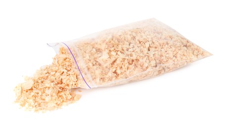 Natural sawdust with zip bag isolated on white