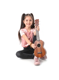 Photo of Little cheerful girl with guitar, isolated on white